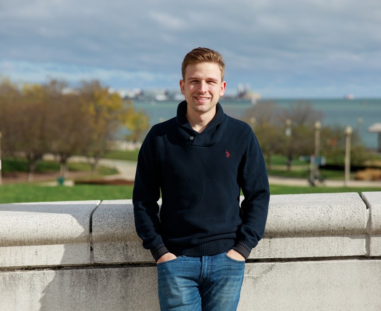 Tim Cardwell standing along the Chicago lakefront